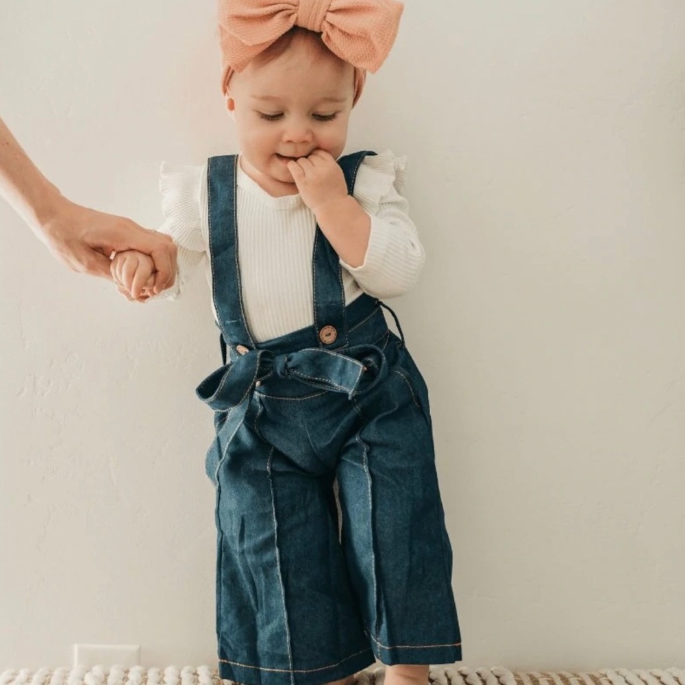 Dark denim suspender jumpsuit
